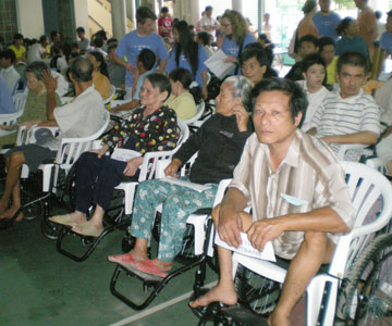 100 handicapped people given wheelchairs
