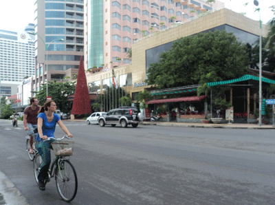 Riding bicycle in Tran Phu Street, Nha Trang.