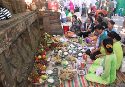 Making offerings outside towers