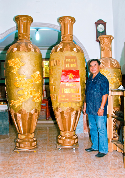 Carton vase pair with dragon-shaped Vietnam map