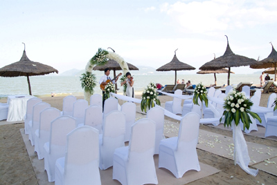 Music makes beach wedding more romantic.