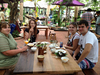 Tourists enjoying Vietnamese food at Champa Garden