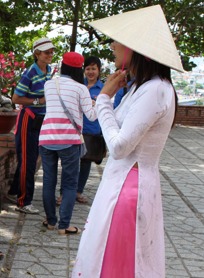 Tourist guide charming in Ao Dai