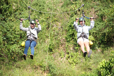 Rope Swing over River at Nhan Tam Ecological Tourist Site