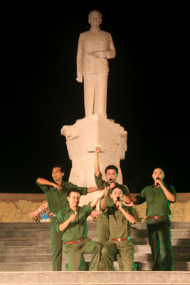 Male group singing a song expressing the gratefulness towards the President.