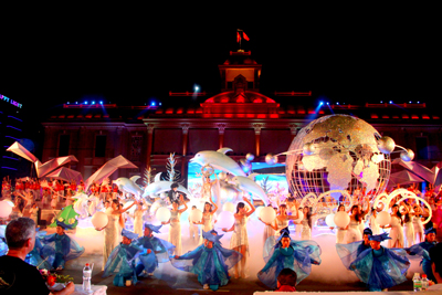 Street festival ends with a singing and dancing item.