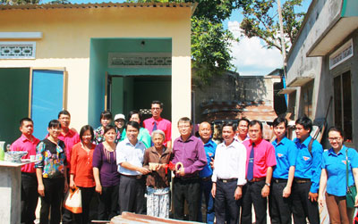 Handing over new house to lonely old woman
