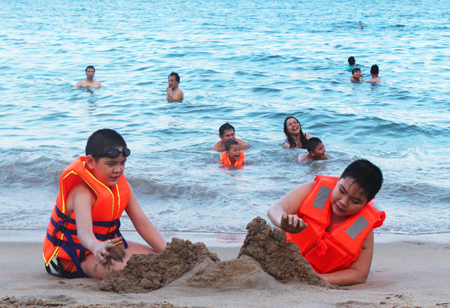 Children playing on the beach.