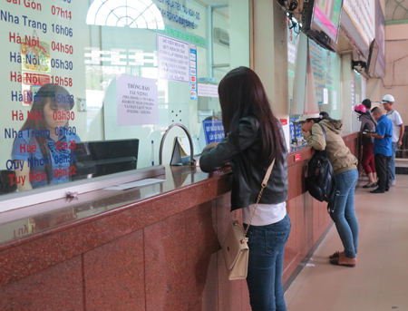 Buying train tickets at Nha Trang Railway Station