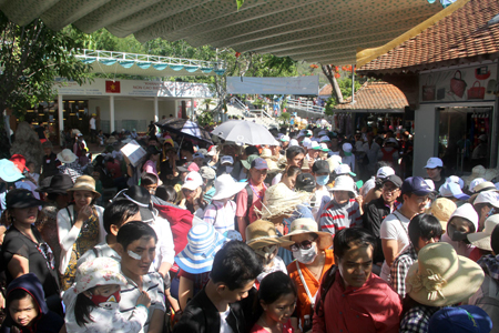 Tourists waiting for boarding.