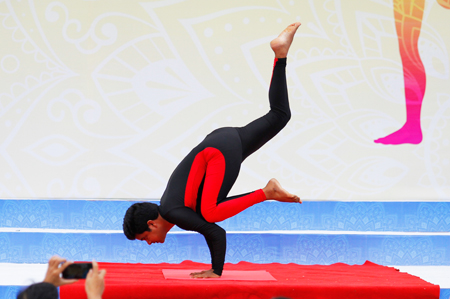 Dr. Kuldeep Kumar Kushwah doing difficult yoga poses.