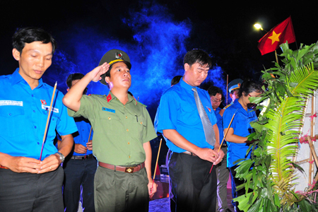 Youth Union members lighting incense.