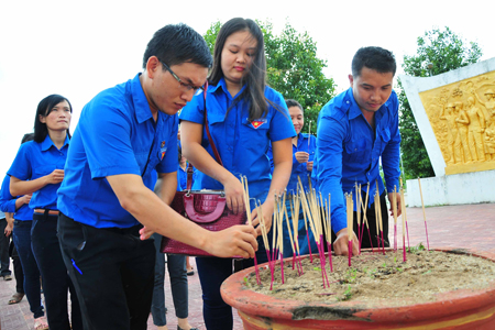 Youth Union members burning incense.