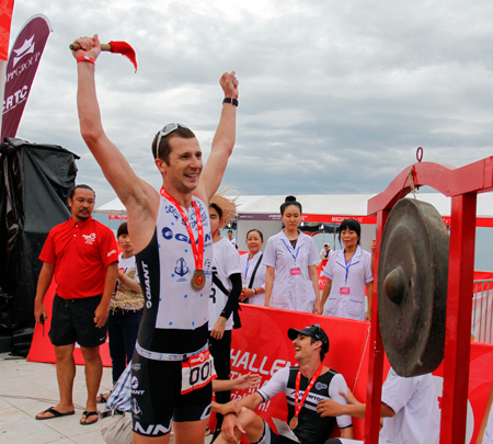 Happiness of athlete finishing second.