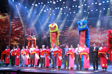 Representatives cutting ribbon at theatre’s opening ceremony.