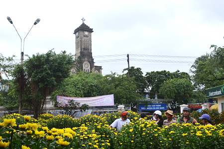 Some people sell Tet flowers on streets.