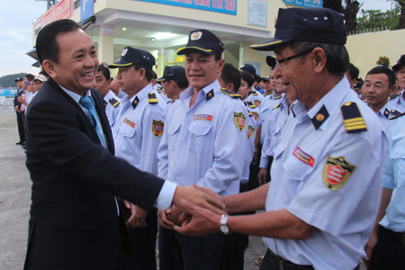 Celebrating start of new year for salanganes island security guards