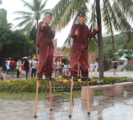 Stilt walking.