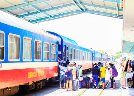 Passengers taking train at Nha Trang Railway Station