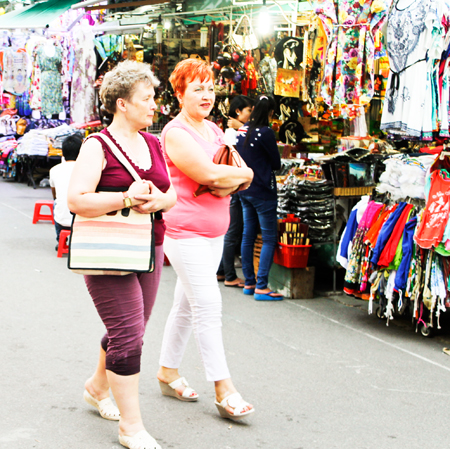 Tourists visiting walking street in Nha Trang