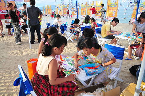 Children decorating masks.