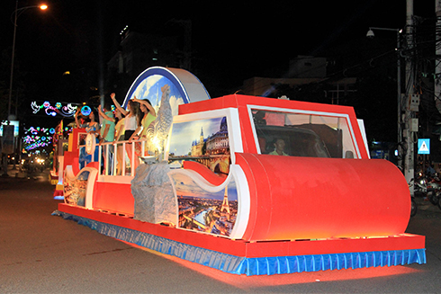 Parade cars are decorated with specific images of France,…