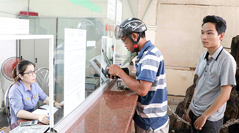 Buying train tickets at Nha Trang Railway Station