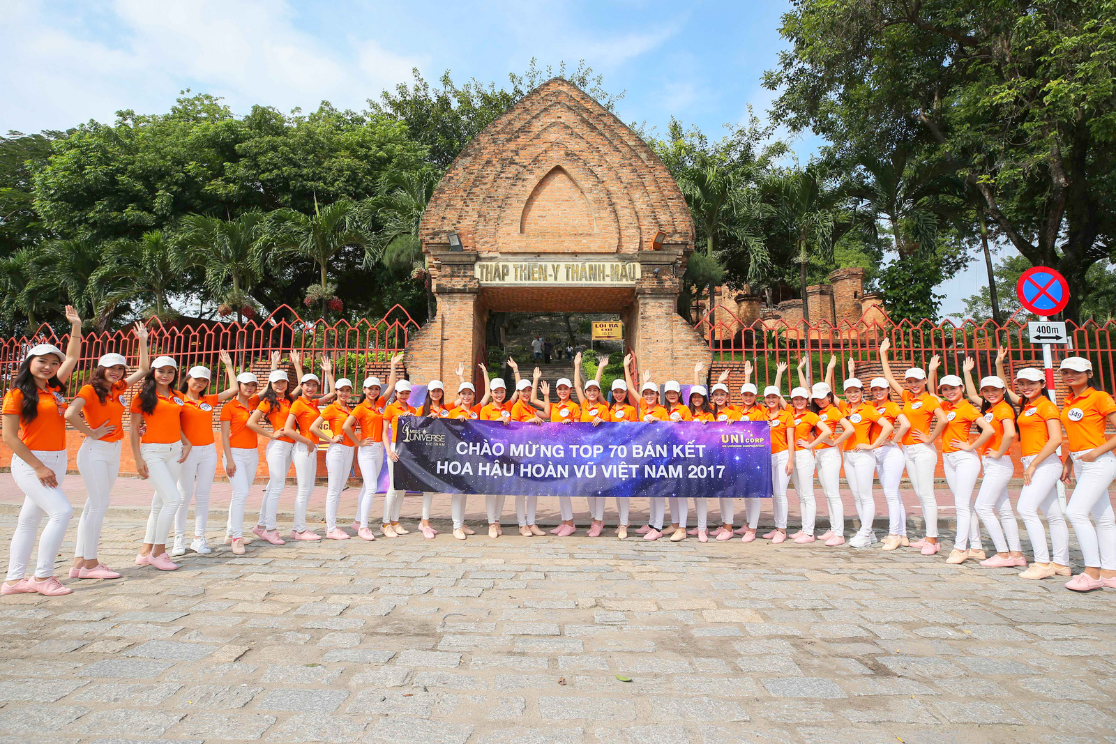 Taking souvenir photo in front of Ponagar Temple