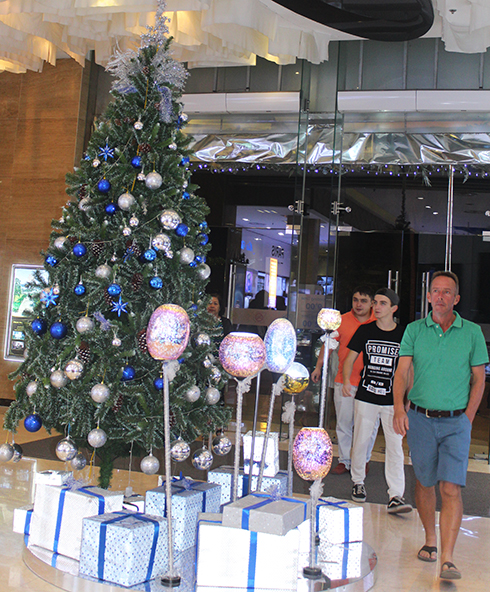 Christmas trees are placed at trade center and super markets.