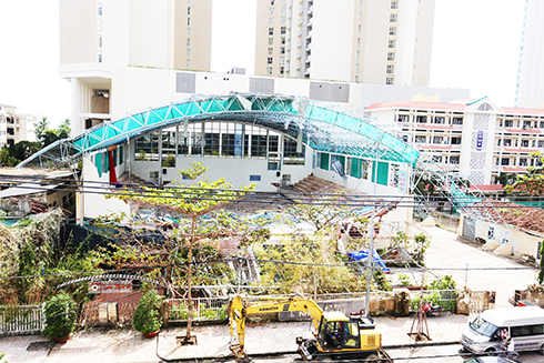 Multi-functional building smashed in typhoon to be reconstructed