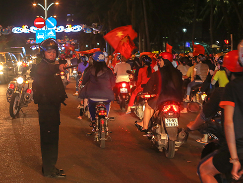 Police patrol the streets to maintain traffic order and safety. 