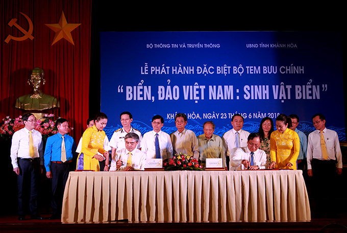 Signing and stamping ceremony to issue stamp set