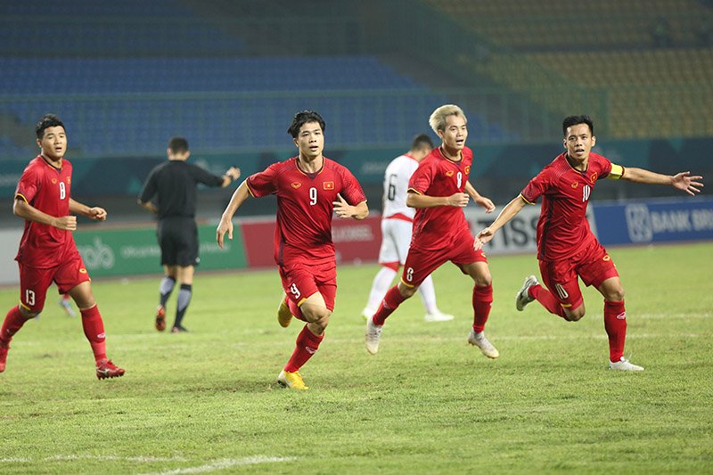 Cong Phuong (number 9) celebrating after striking goal