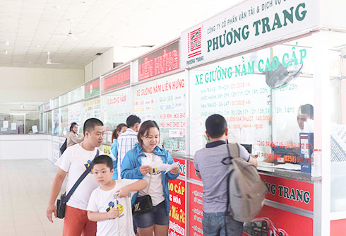 Buying bus tickets at Nha Trang southern bus station