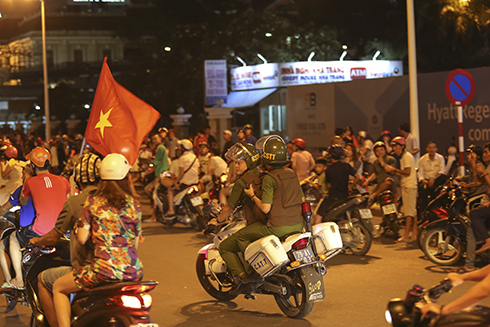 Police patrol the streets to maintain order 