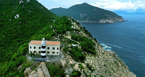 Lighthouse on Bich Dam Island, built in 1890, 102 meters above sea level, one of five oldest lighthouses in Vietnam.