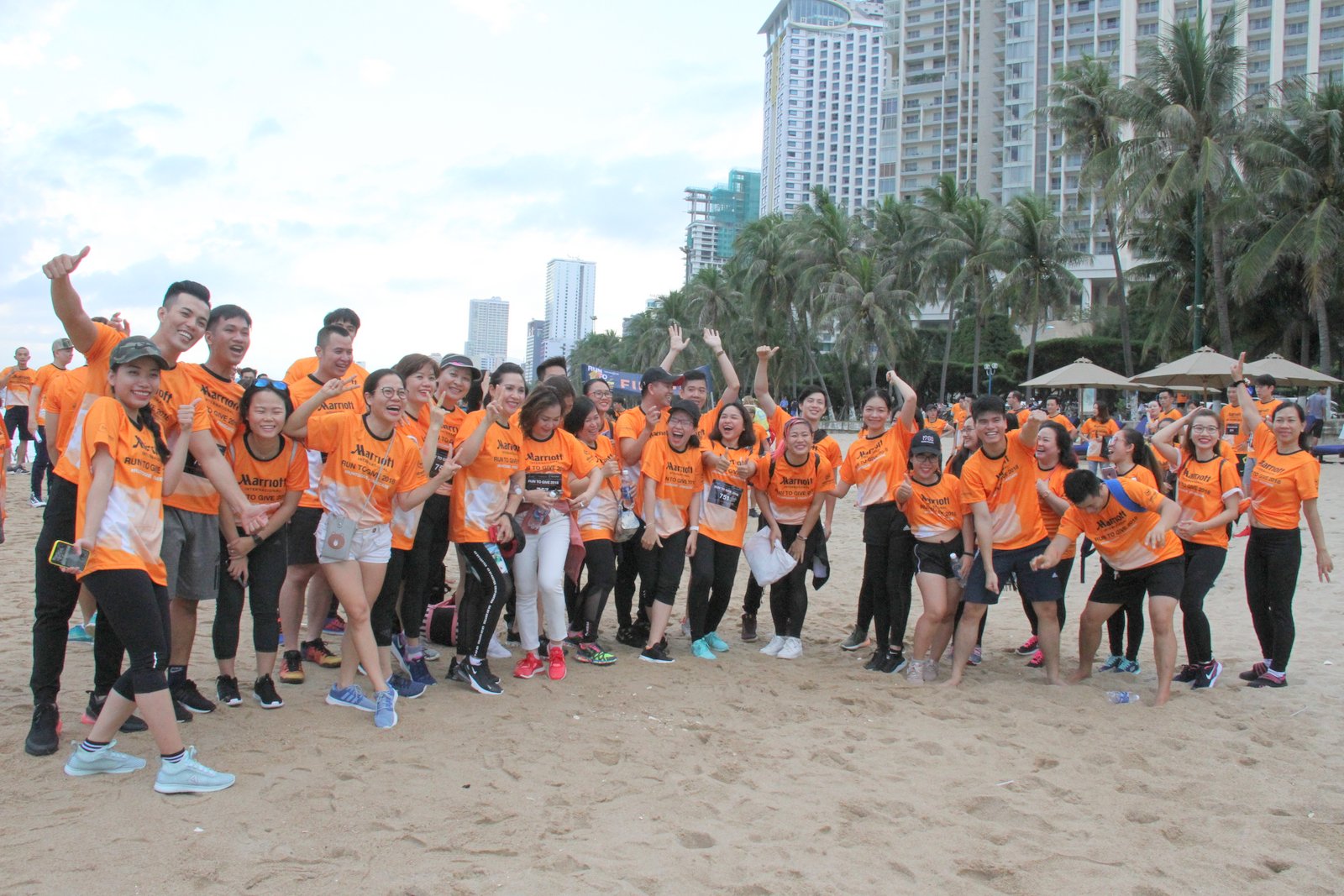 Group of runners posing for photograph