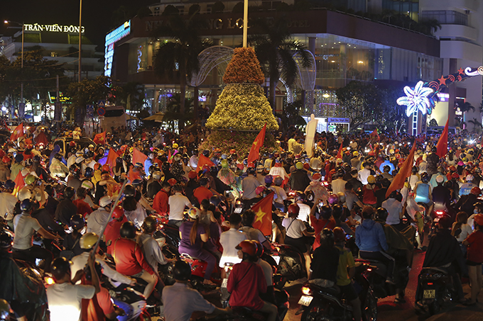 Street covered by football fans