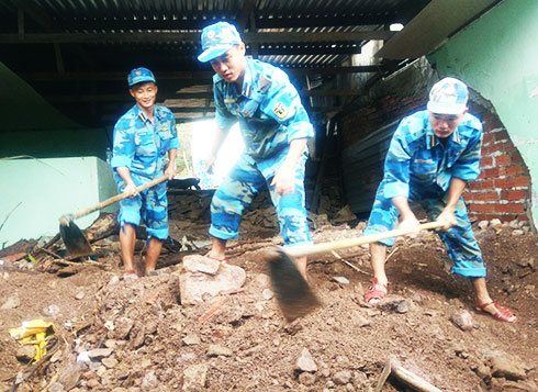 Navy Academy helps with flood damage repair