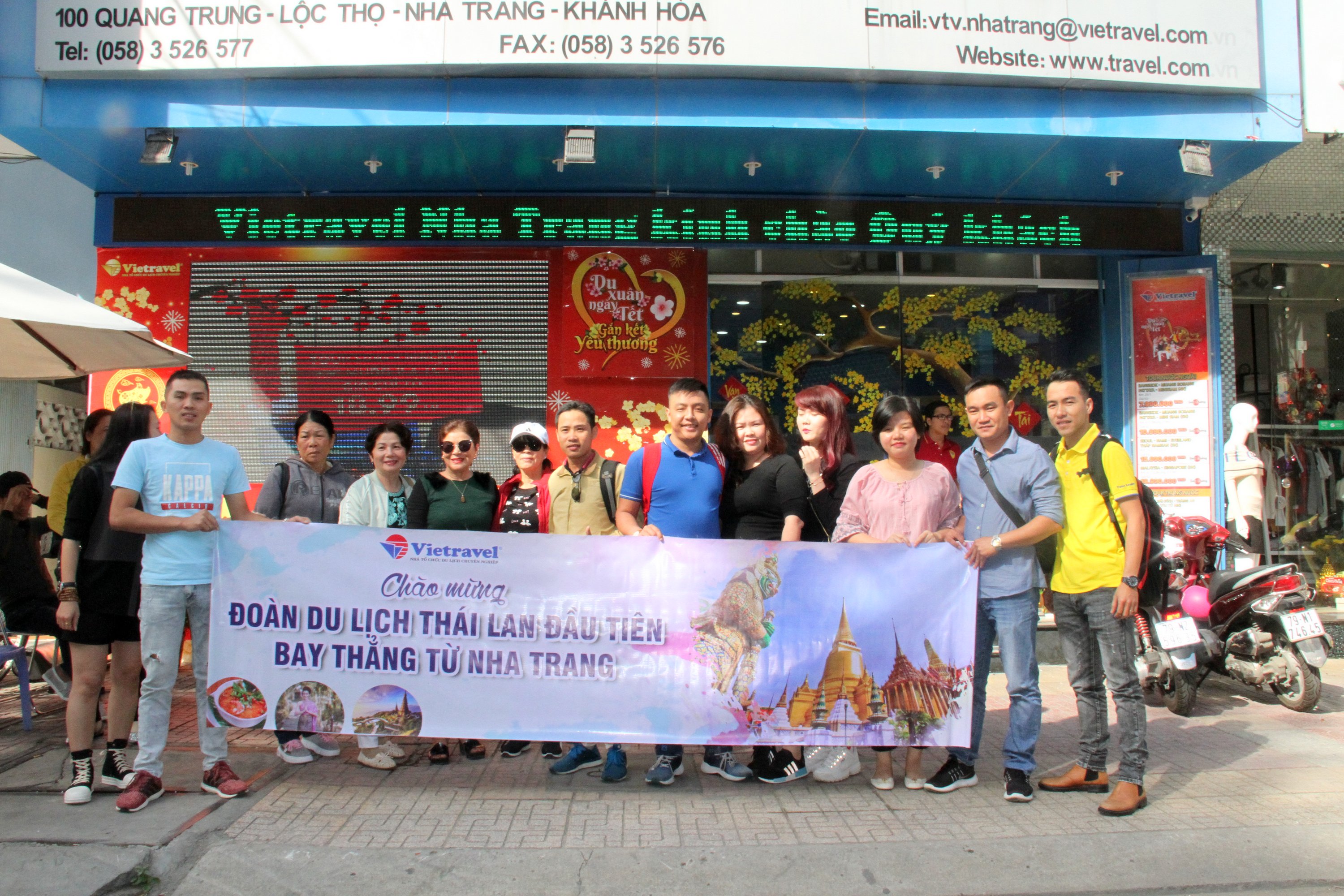 Tourists posing before flying to Thailand