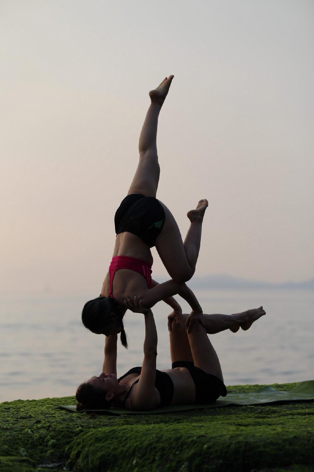Practicing yoga on beach in Nha Trang