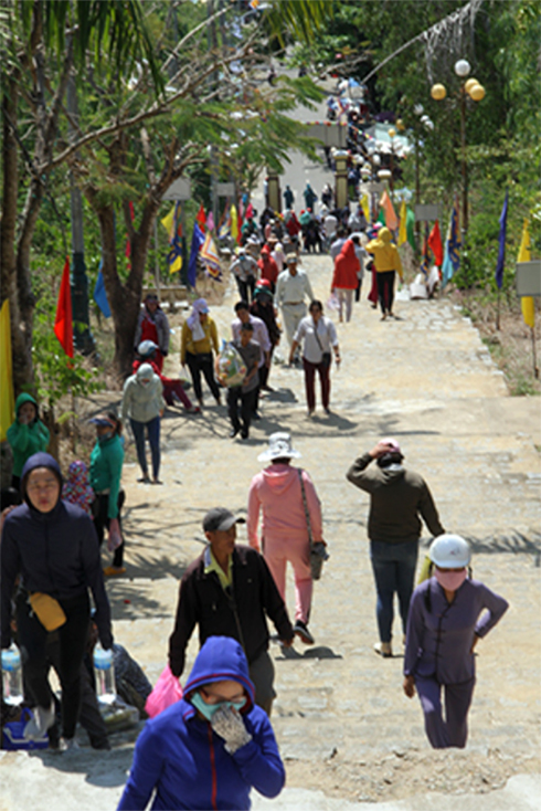 Visitors at Am Chua Monument