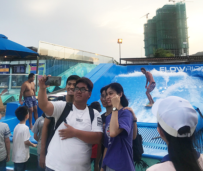 Posing for photo at Ana Marina Flowhouse