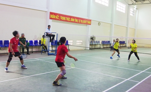 Players playing badminton