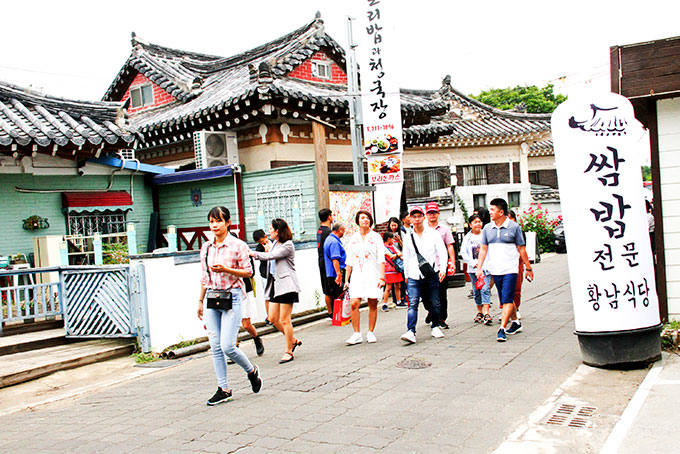 Nha Trang tourists visiting an old street in Gyeongju, South Korea