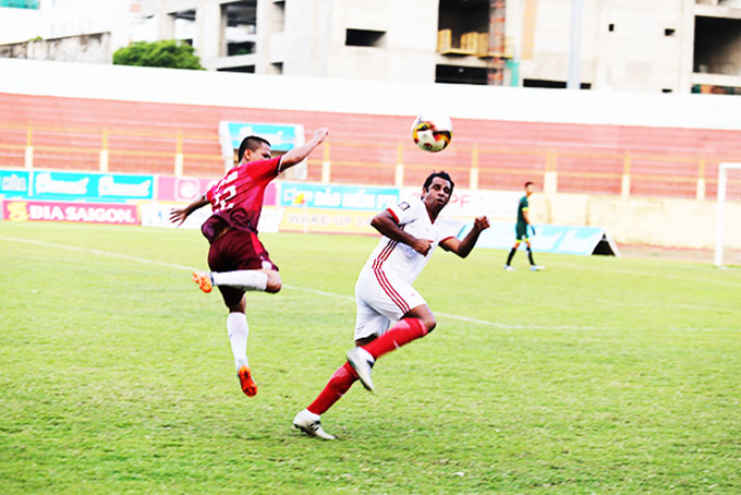 Former players of Vietnam and Iran playing at international friendly contest