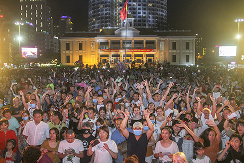 A lot locals and tourists watching music show on Lunar New Year’s Eve