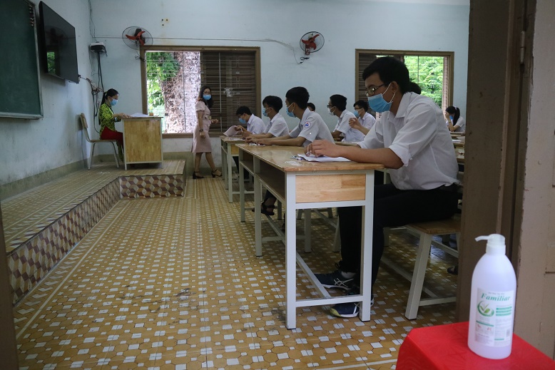 Hand sanitizer is placed in front of examination room