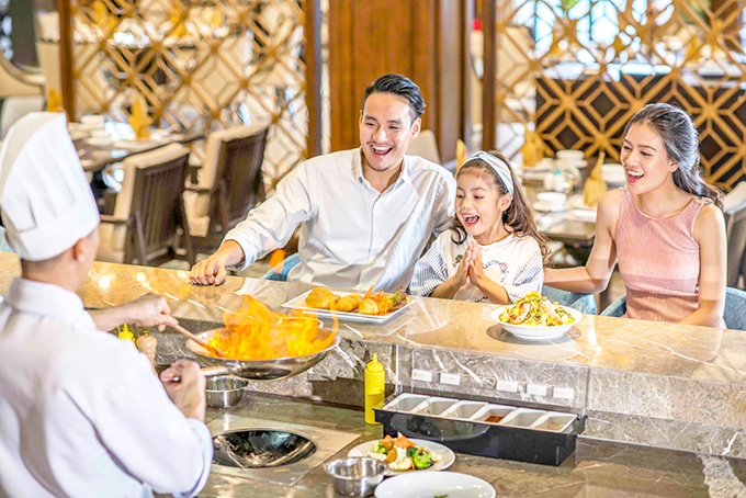 Tourists enjoying food in Vinpearl Nha Trang