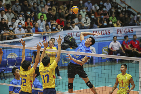 Ngo Van Kieu spiking the ball